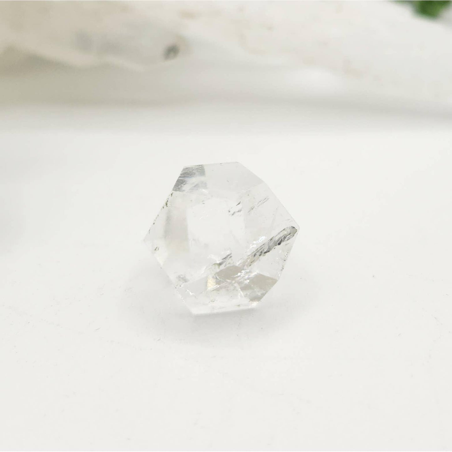 Clear Quartz Sacred Geometry Set – 7 Carved Crystals + Merkaba & Sphere with Grid & Pouch