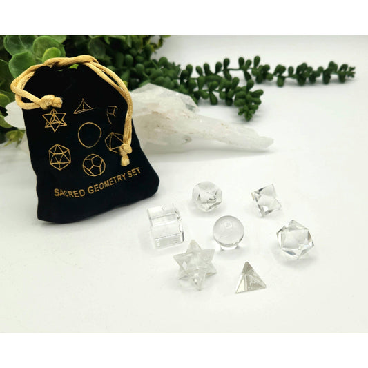 Clear Quartz Sacred Geometry Set – 7 Carved Crystals + Merkaba & Sphere with Grid & Pouch